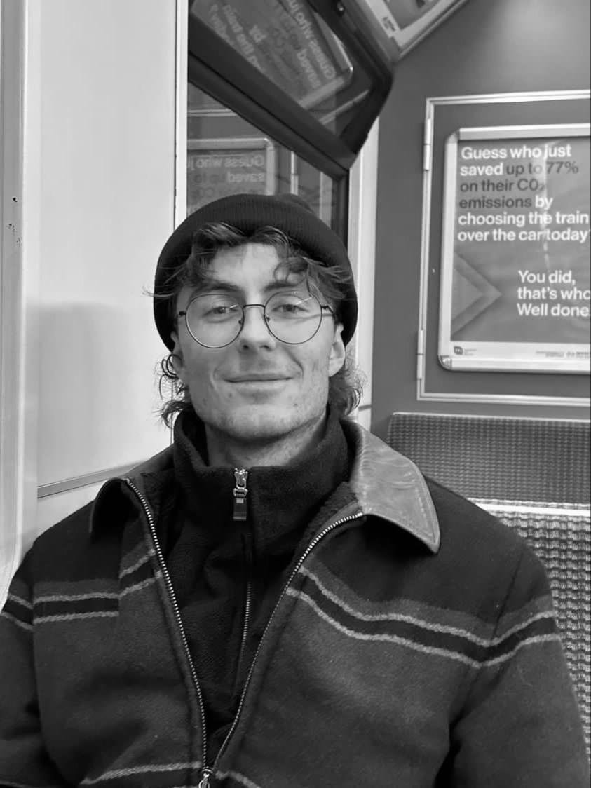 Man in jacket and hat